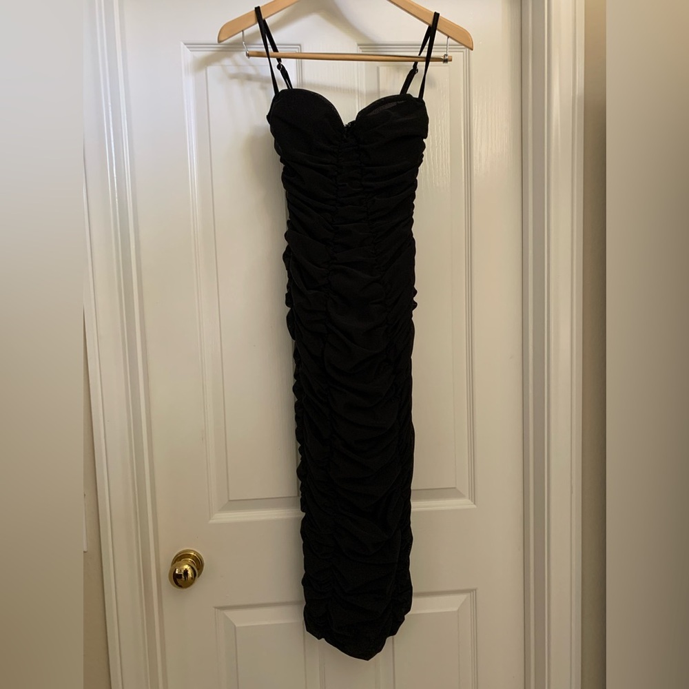 Leau woman’s black midi dress.